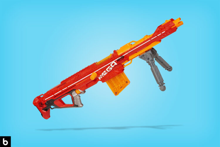 This is the cover photo for our Best Nerf Sniper Rifle article. It features a red Nerf Mega sniper overlaying a blue background with drop shadow.