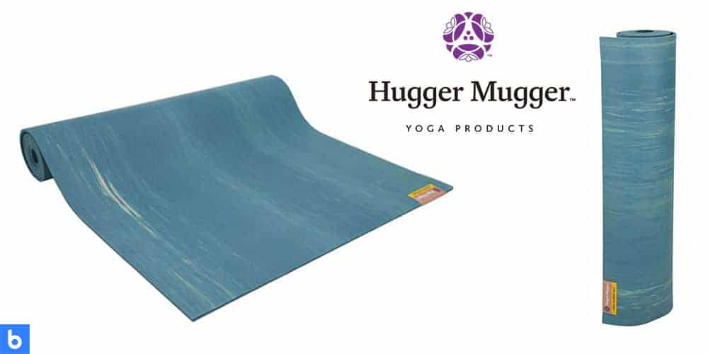 This is a photo of the Hugger Mugger Para Rubber Yoga Mat overlaid on a minimalistic white background with a Burbro logo.