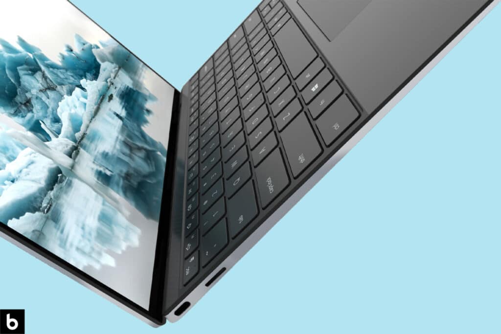 This is the cover photo for our Best Laptops for College Students in 2023 Buying Guide. It features a Dell XPS 13 laptop hovering in limbo, with a sky blue background.