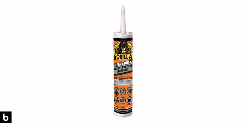 This is a photo of a tube of Gorilla Heavy-Duty Construction Adhesive overlaid on a minimalistic white background with a Burbro logo.