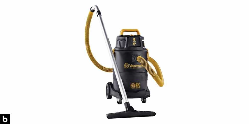 This is a photo of a yellow and black VacMaster Pro HEPA Shop Vac overlaid on a minimalistic white background with a Burbro logo.
