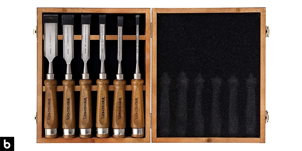 This is a photo of the Imotechom Woodworking Chisel Set, which we’ve chosen as the best premium woodworking chisel set in 2023. The set has a dark stained wood handle with a stainless-steel shaft, and are carried in a wooden carrying case/gift set. This image is overlaid on a white minimalistic background with a Burbro logo in the corner.