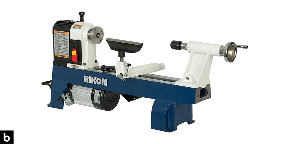 This is a product image in our Best Wood Lathe 2023 article. It is a Rikon 70-100 Mini Wood Lathe overlaid on a minimalistic white background with a Burbro logo.
