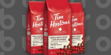 This is the cover photo for our Best Budget Coffee Beans article. It features 3 red and white bags of Tim Horton's whole bean medium roast coffee, overlaid on a dark grey background with embossed Burbro logo.