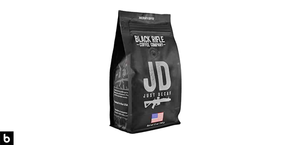 This is a product image, featuring a black and white bag of Black Rifle 'Just Decaf' coffee.