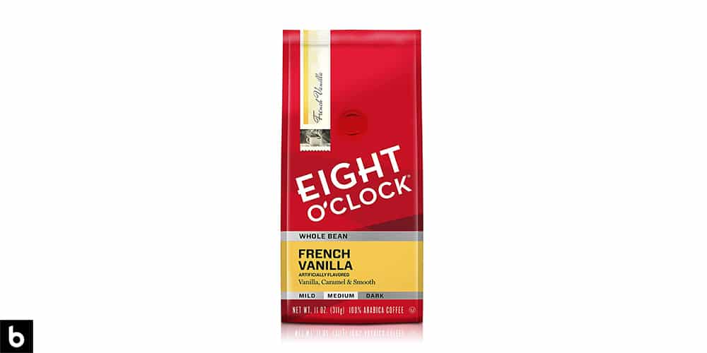 This is a product image, featuring a red and yellow bag of Eight O'Clock French Vanilla flavored coffee.