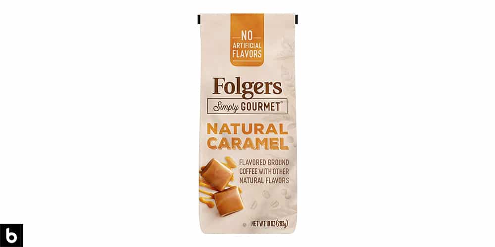 This is a product image, featuring a bag of Folgers simply gourmet natural caramel flavored coffee.
