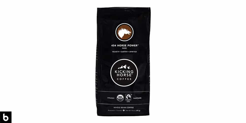 This is a product photo, featuring a black bag of Kicking Horse '454 Horse Power' Dark Roast Coffee.