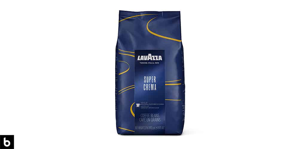 This is a blue and gold bag of Lavazza Super Crema Coffee Beans overlaid on a white background.