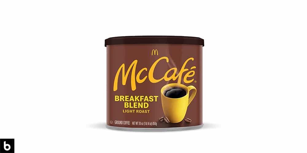 This is a product image of a tin of McDonald's McCafe breakfast blend coffee.