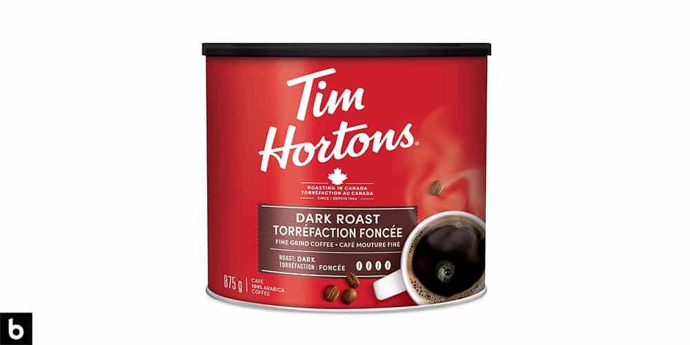 This is a product photo of a red can of Tim Horton's dark roast coffee.