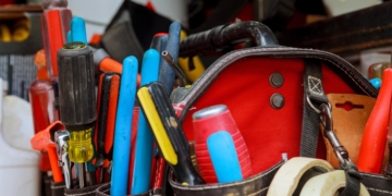 This is the cover photo for our Best Tool Bag article. It features a red tool bag full of tools.