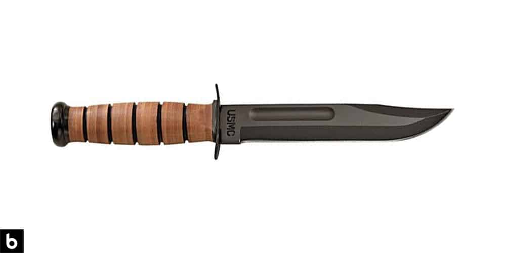 This is a product photo, featuring a Ka-Bar Marine Corps combat knife.