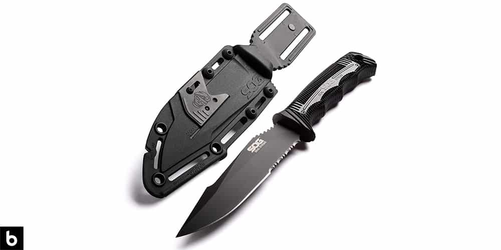 This is a product image, featuring a black SOG Seal Team Elite Survival knife with a black poly sheath.